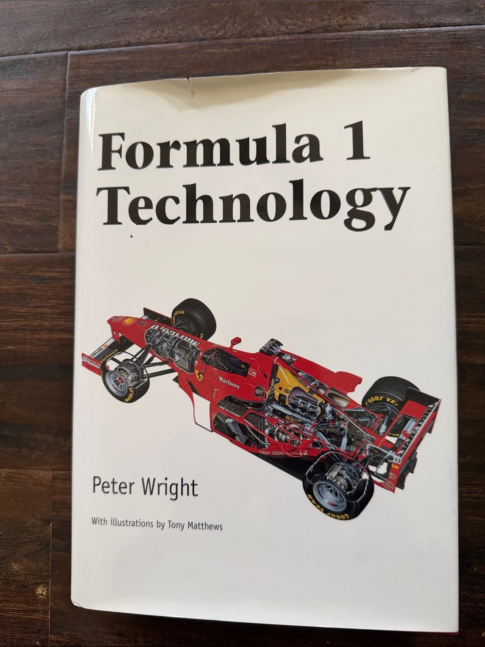 Formula 1 Technology by Peter Wright - White Cover with Red Race Car